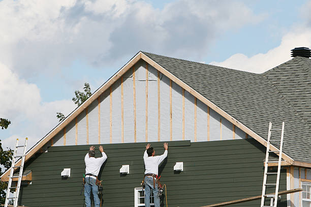 Professional Emergency Siding Repair technician working in Harrison, NY